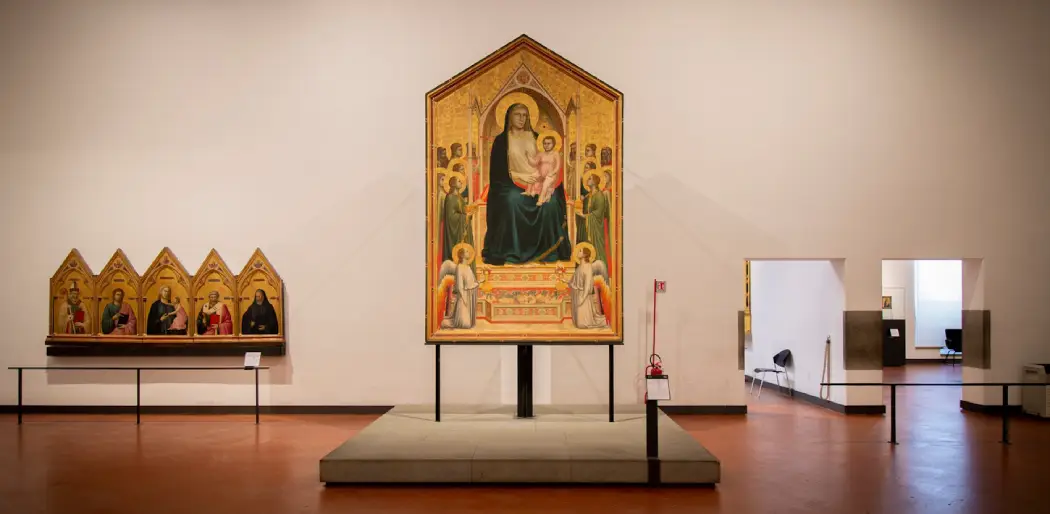 The portrait of Maesta di Ognissanti displayed at the Uffizi Gallery